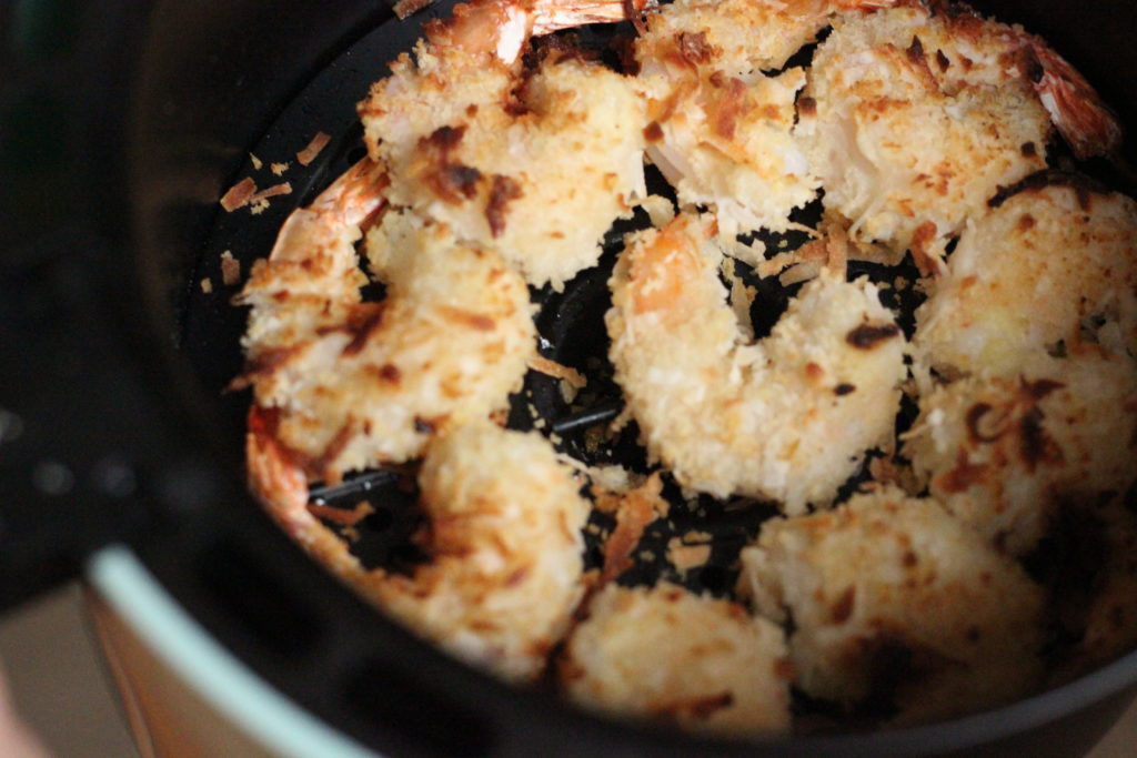 Toasted Coconut Shrimp in an air fryer pan.