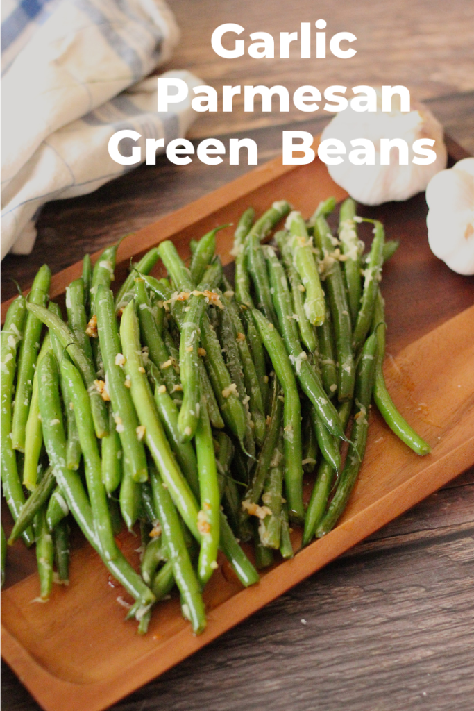 You know you've got to eat some greens....why not make the delicious!! This is a simple recipe for GARLIC PARMESAN GREEN BEANS that will go perfect with whatever you are serving for dinner!! #greenbeans #eatyourveggies #feedingyourfam #parmesan Green beans with toasted garlic and parmesan cheese
