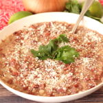refried beans in a white serving bowl