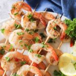 grilled shrimp skewers on a plate