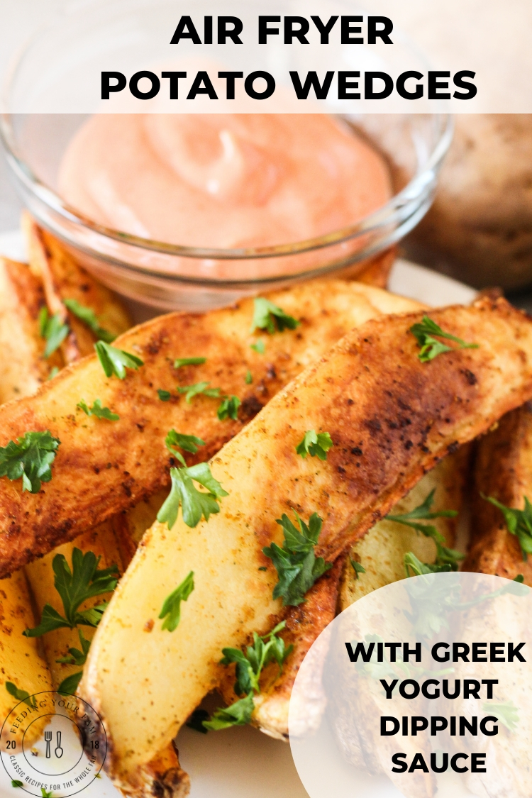 Air Fryer Potato Wedges are seasoned perfectly and cooked to a golden crisp in the air fryer. Served with a tangy greek yogurt dipping sauce, they are the perfect dish to serve as a side dish or tasty mid-day snack! #potatowedges #airfryerrecipes #greekyogurtdippingsauce air fryer potato wedges on a plate with greek yogurt dipping sauce