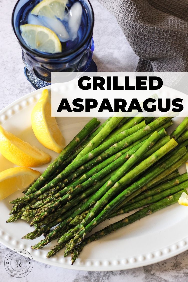 Grilled Asparagus is a special treat and perfect vegetable side dish to whatever you are grilling! This grilled asparagus recipe has a hint of lemon and garlic and couldn't be easier to prep and make! #asparagus #grilledasparagus #grilledvegetables #asparagusrecipes grilled asparagus