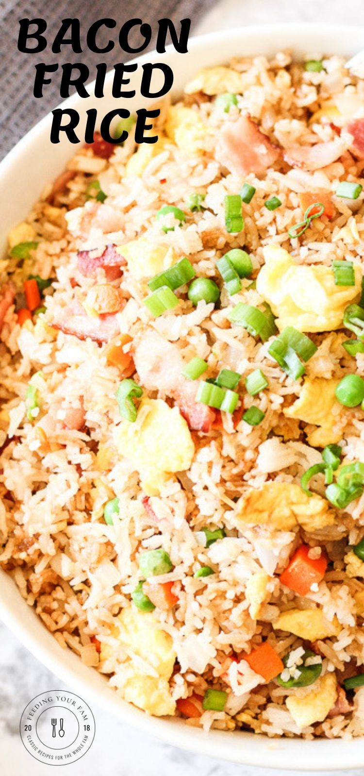 Bacon Fried Rice is a simple go to dish that is full of vegetables, rice and of course bacon! This is a staple recipe around our house, we usually have all of these ingredients on hand and this can be made quick. Dinner win!! #friedrice #bacon #ricerecipes closeup of fried rice