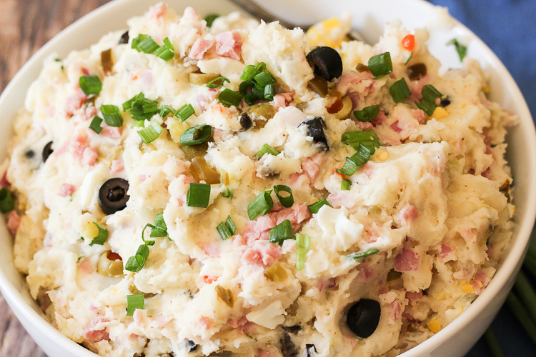 mashed potato salad in a white bowl
