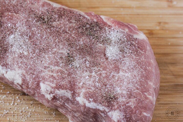 pork loin roast seasoned with salt and pepper