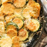 sauteed zucchini and yellow squash in a cast iron pan