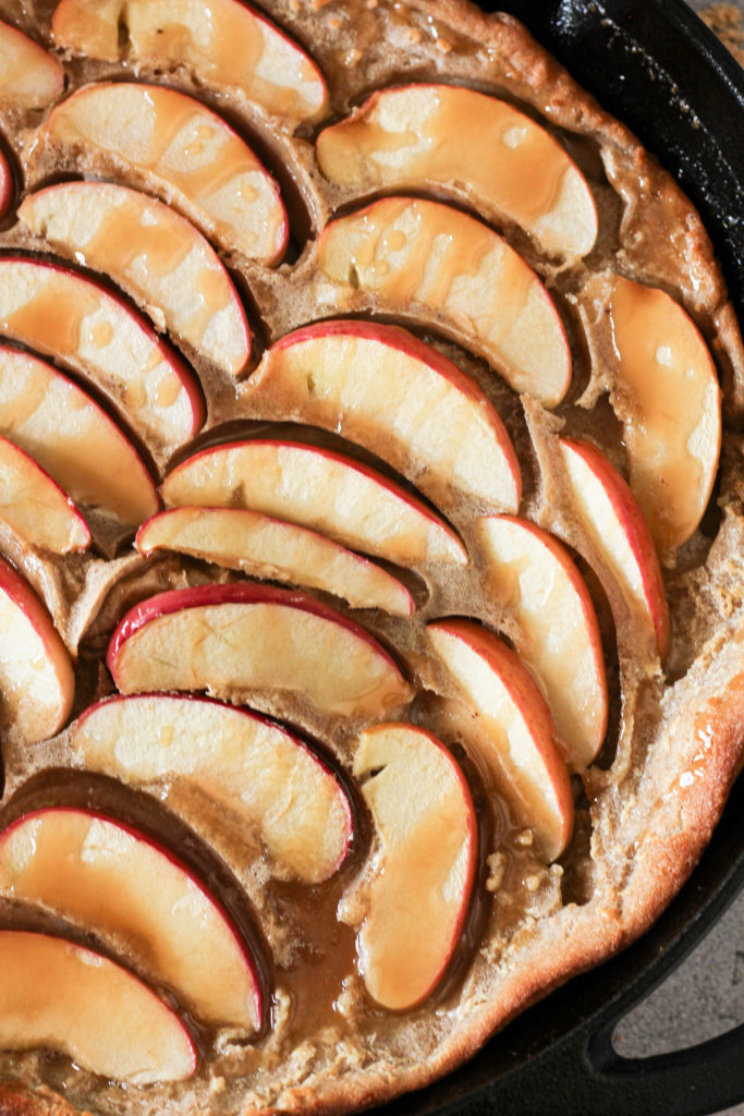 german apple pancakes in a cast iron skillet
