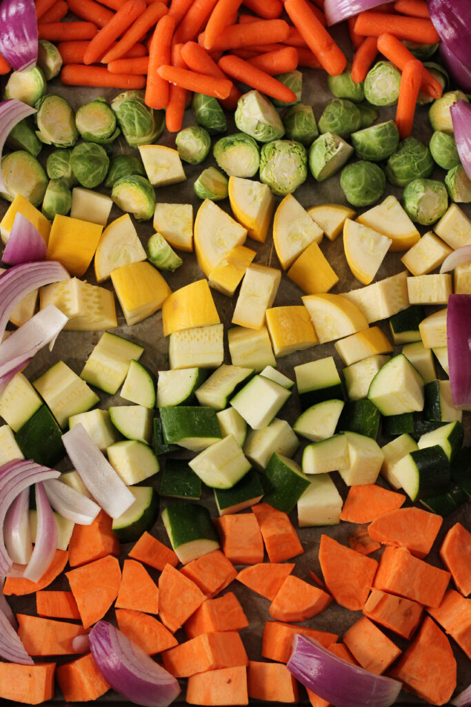chopped vegetables on a sheet pan