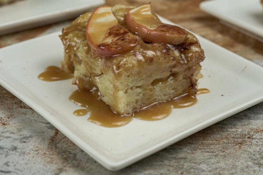 apple bread pudding drizzled in caramel