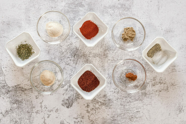 spices in glass bowls for fajita seasoning
