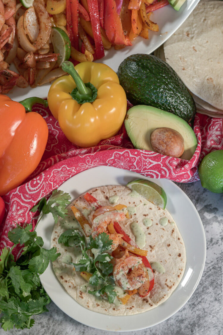 shrimp fajita on a white plate