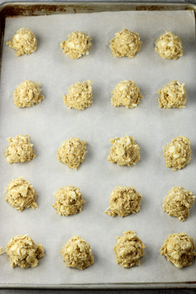 scoops of cookies on a cookie sheet