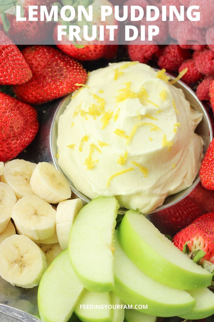 Lemon Pudding Fruit Dip is a delicious combination of lemon pudding and Cool Whip or whipped topping. This Fruit Dip comes together super fast with just 3 simple ingredients! This simple dip is perfect for taking along to a neighborhood potluck or family get together! bananas, strawberries, raspberries and green apples surrounding yellow lemon fruit dip in the center