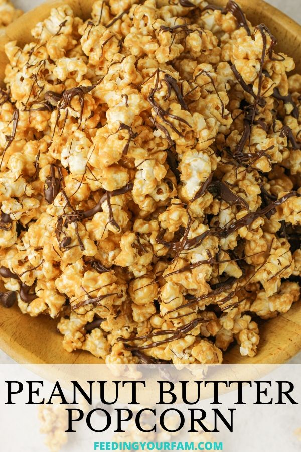 Peanut Butter Popcorn is a simple treat made with 4 simple ingredients you probably already have in your home. Popcorn, peanut butter, honey and a little chocolate is all you need to make this delicious peanut butter popcorn recipe. peanut butter popcorn covered with a chocolate drizzle