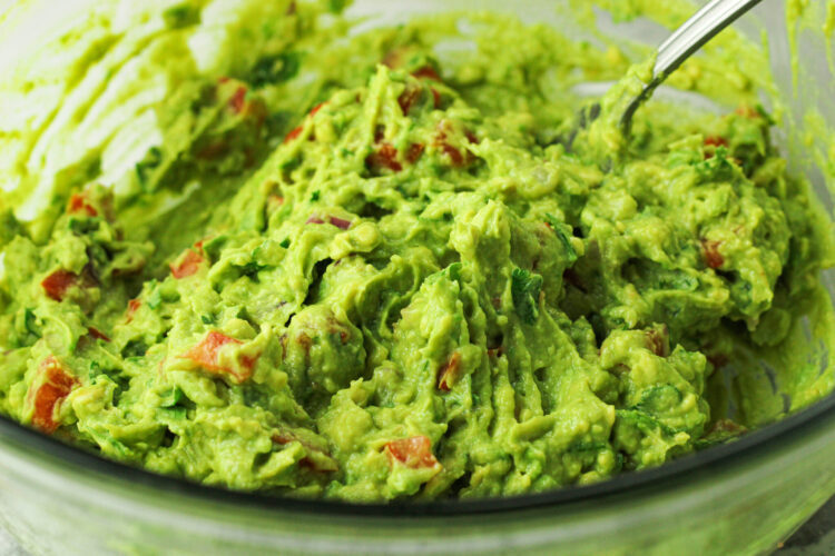 guacamole in a glass bowl