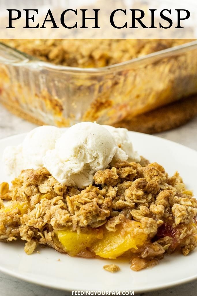 This Easy Peach Crisp recipe is a refreshing combination of fresh peaches, spices and sugar with a crunchy, buttery oat topping. Peach Crisp is a simple dessert that can be put together quick and only takes 30 minutes to bake. #peaches #peachcrisp #dessertrecipes #dessert #summerdessert peaches topped with granola topping on a white plate