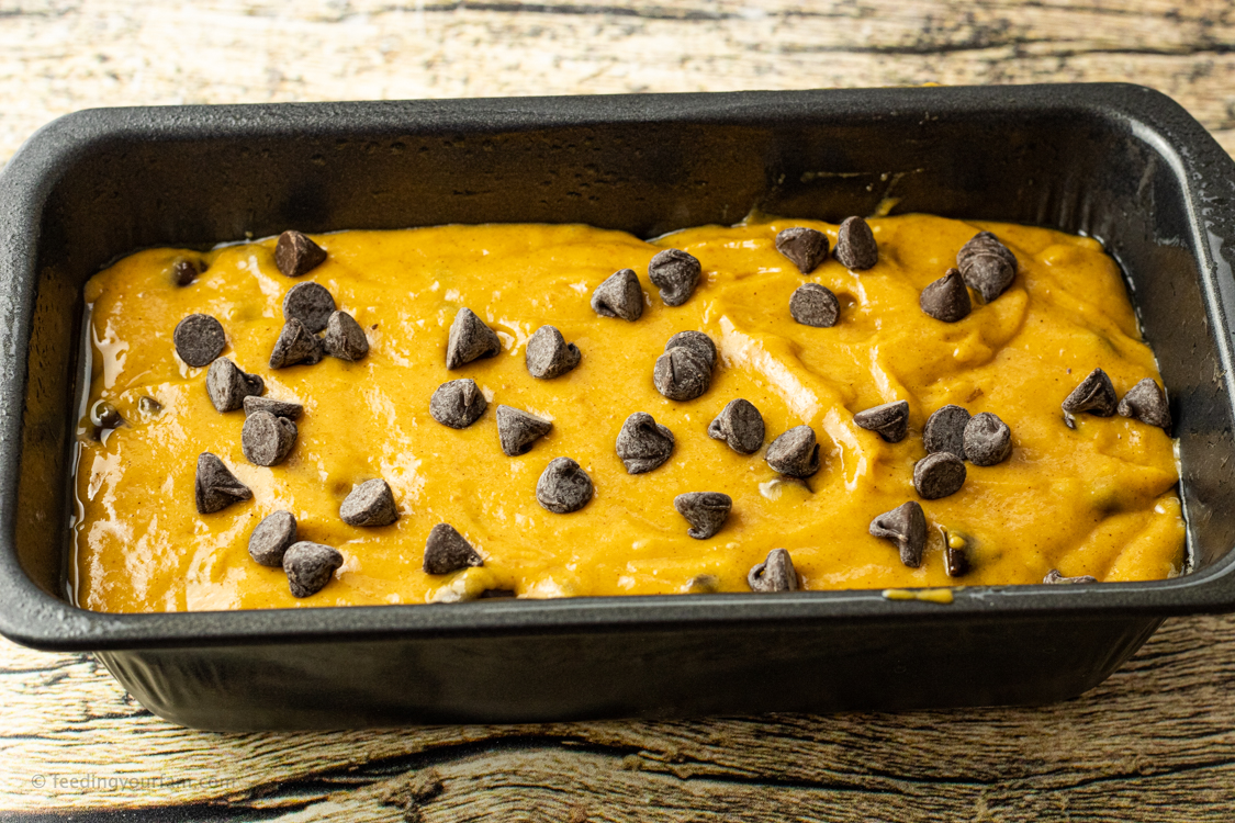 pumpkin chocolate chip bread in a pan before cooking