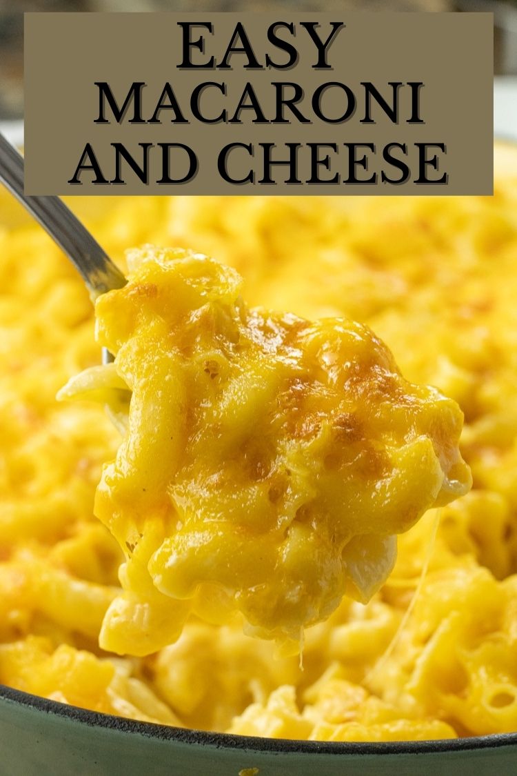 spoon holding a scoop of mac and cheese