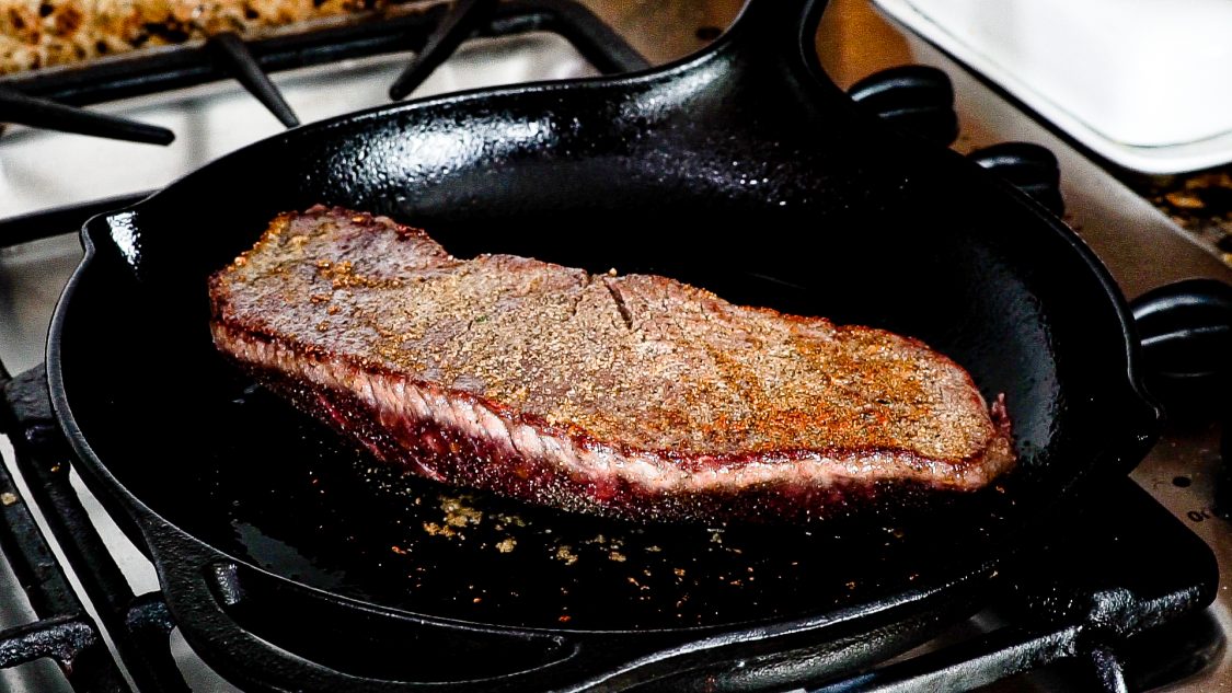 top round in a cast iron pan