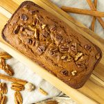 pumpkin bread on a wooden cutting board