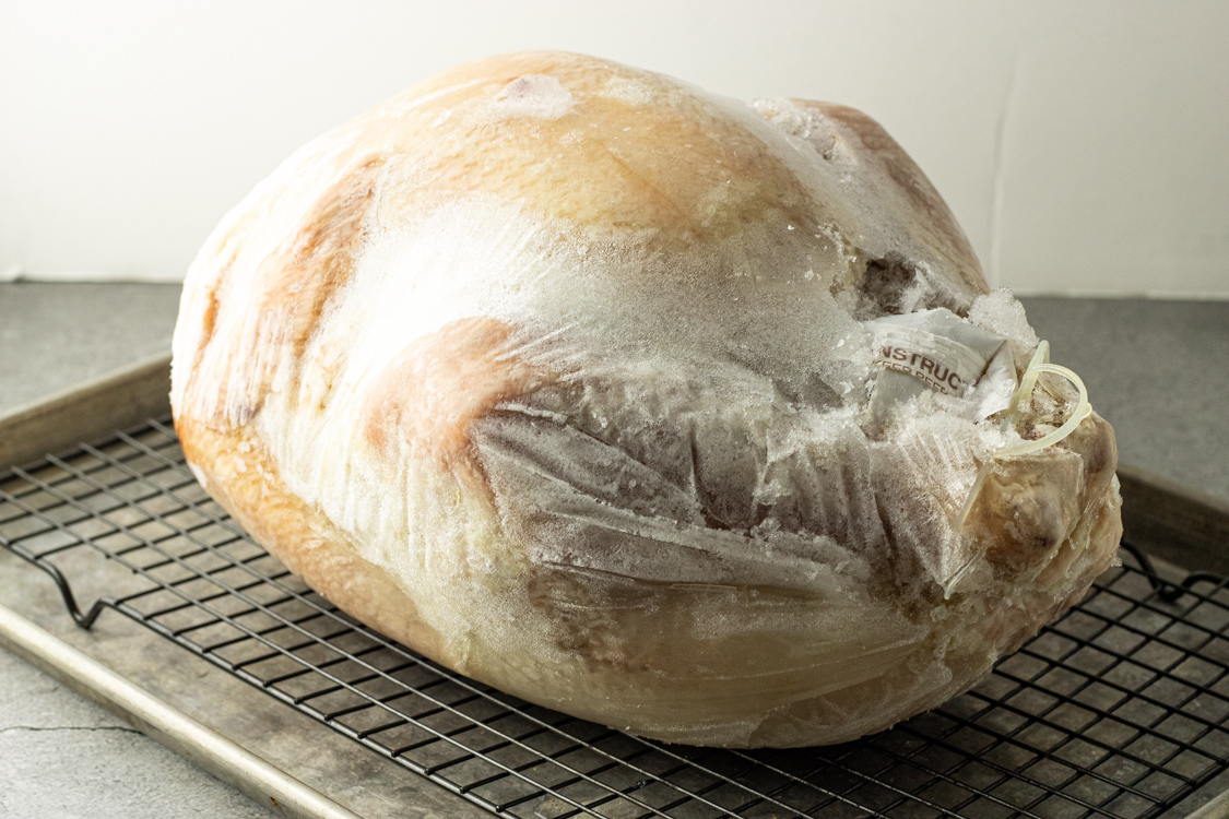 frozen turkey on a baking sheet