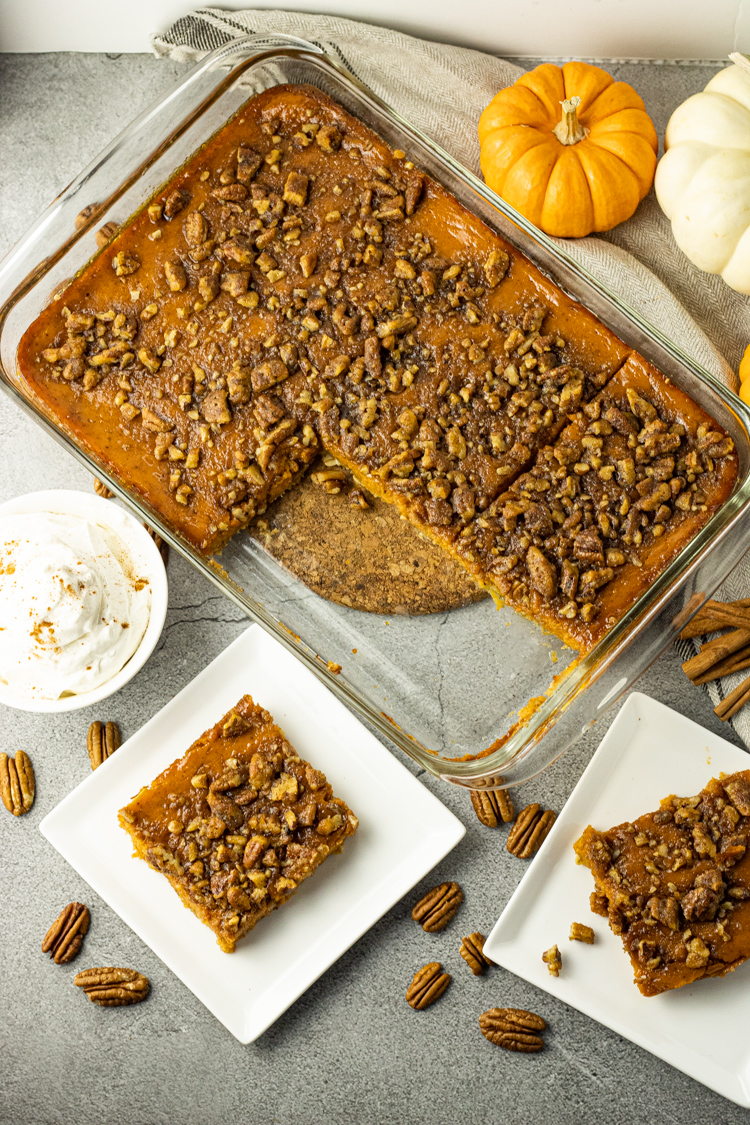 pumpkin pie bars sliced and on a white plate