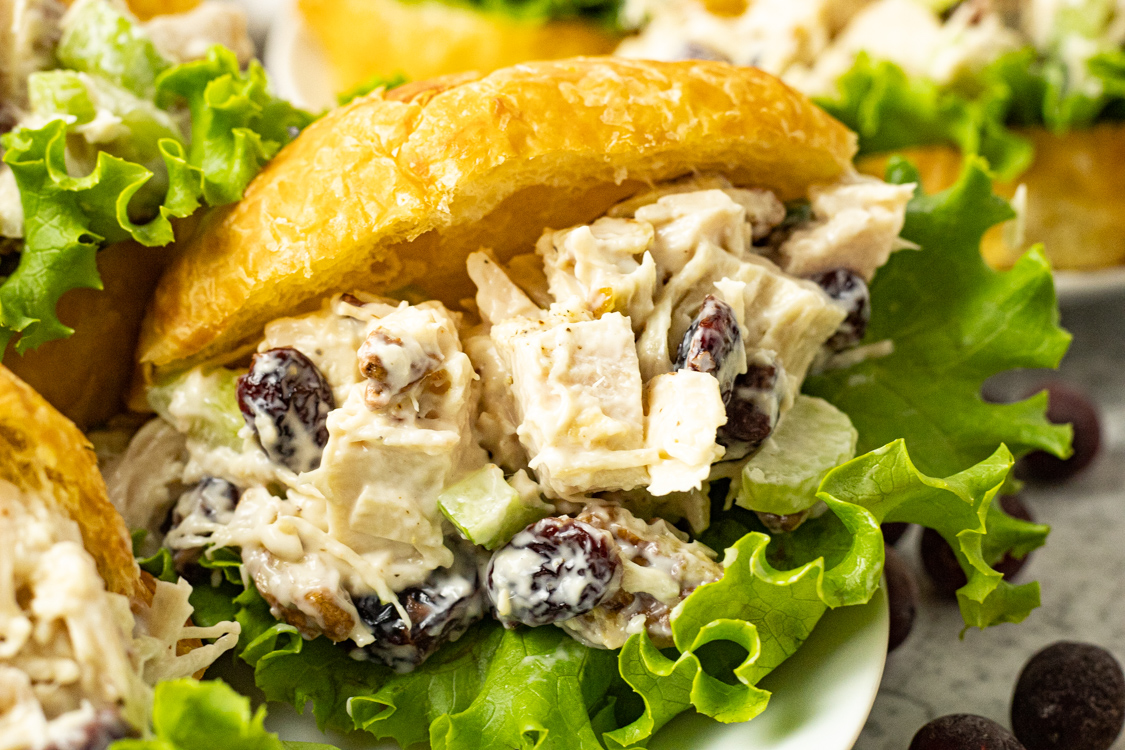 turkey salad on a sliced croissant