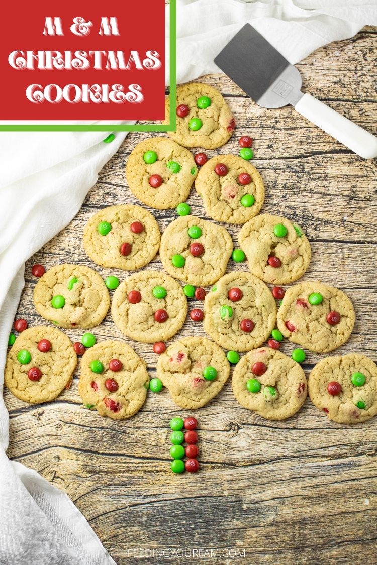 M & M Christmas Cookies have a soft cookie loaded with crunchy, chocolate candies. Perfect for all the holiday parties and cookie exchanges. 
