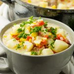 gray bowl of potato soup