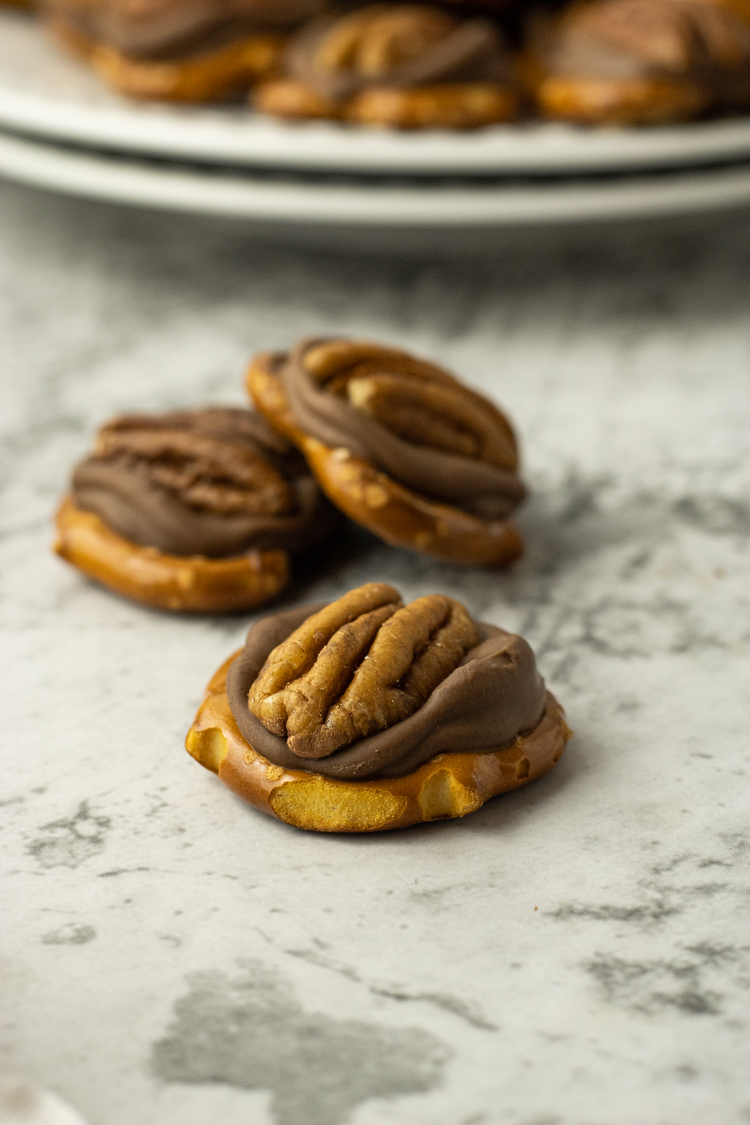 Rolo candies melted on pretzels then topped with a whole pecan