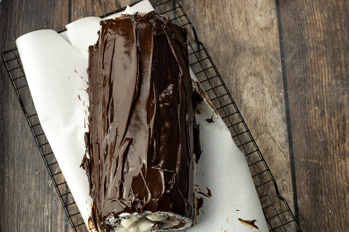 chocolate glaze on top of chocolate roll cake
