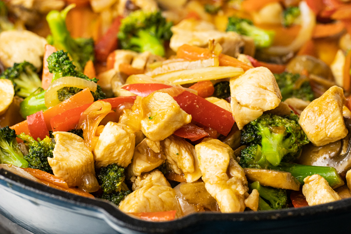 chicken stir fry in a large pan