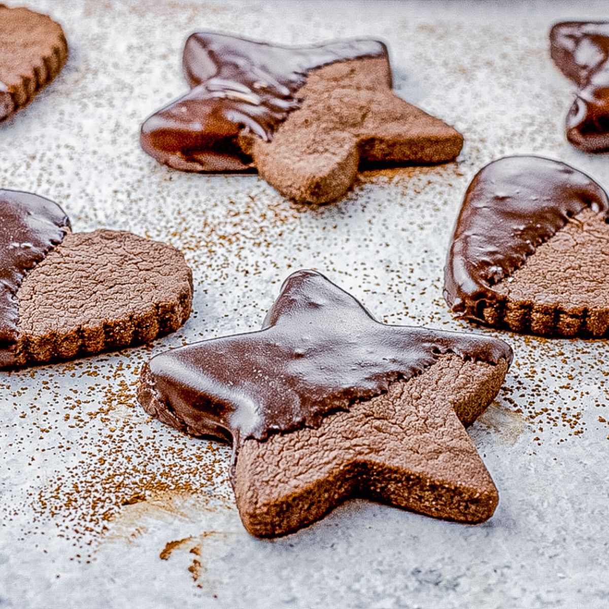 star chocolate cut out cookie. Half dipped in chocolate glaze