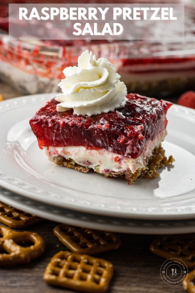 Raspberry Pretzel Salad is a potluck favorite. Layers of salty pretzels topped with a creamy cream cheese layer and raspberry jello with raspberries.