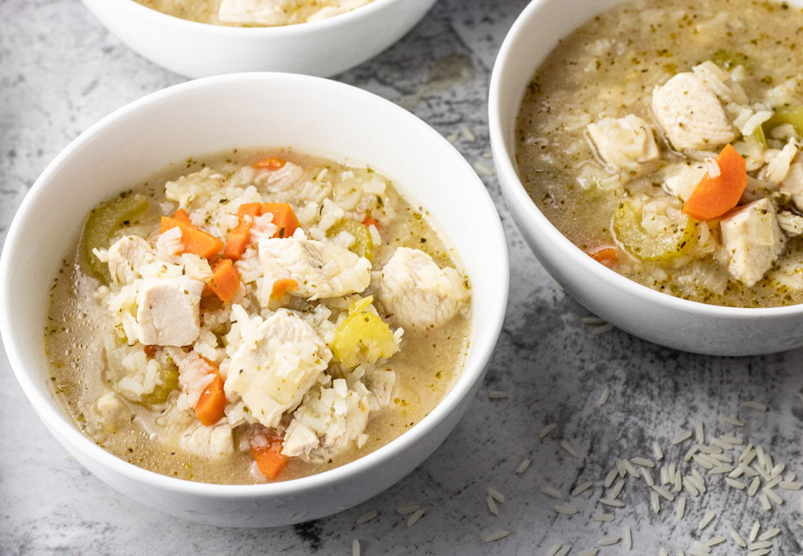 bowl of soup with rice and chicken