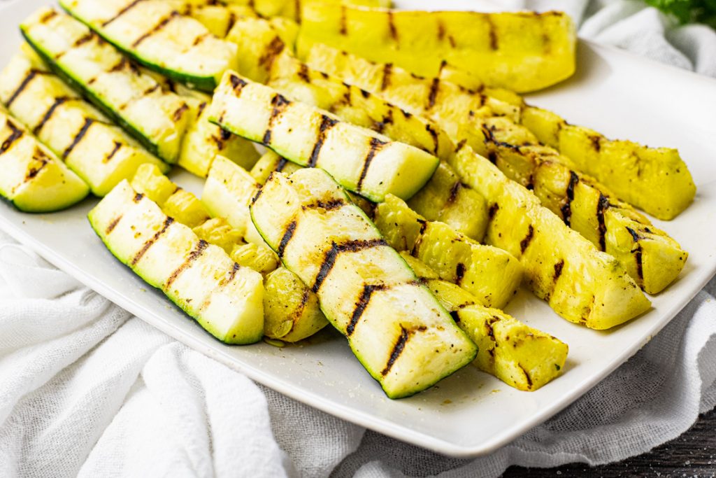 grilled zucchini on a white plate