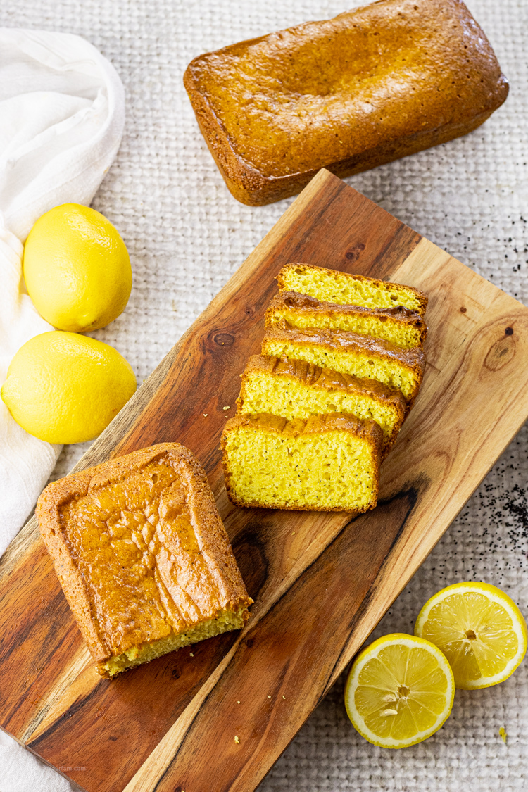 slices of yellow lemon bread on a wooden platter