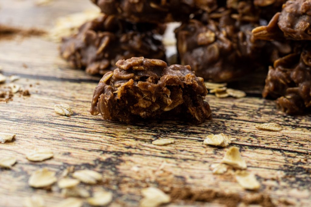 no bake chocolate cookie with oatmeal broken in half