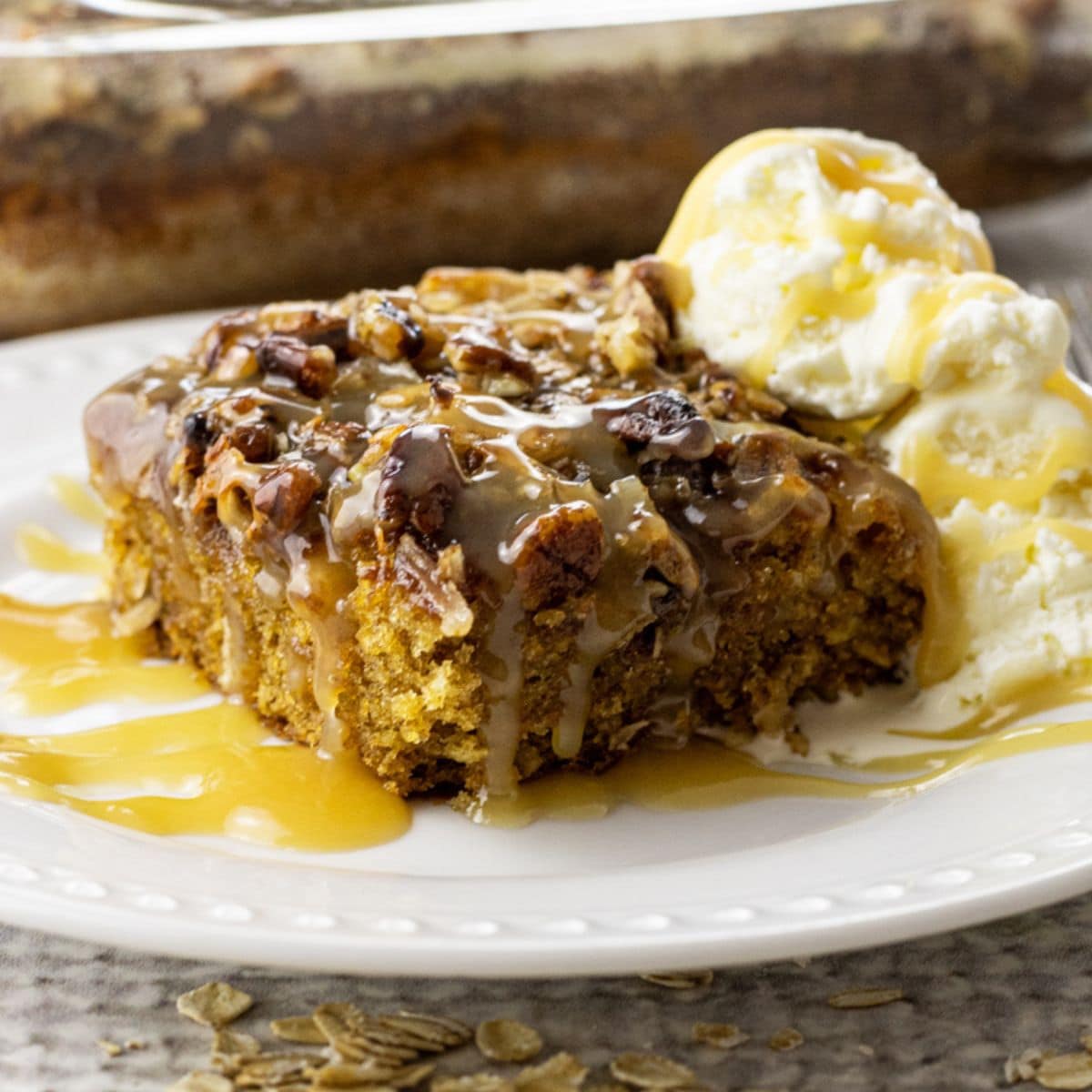 oatmeal cake topped with caramel and ice cream
