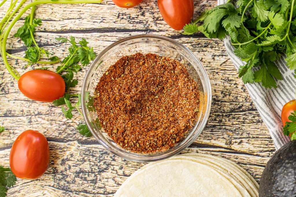 small glass bowl of seasoning for tacos