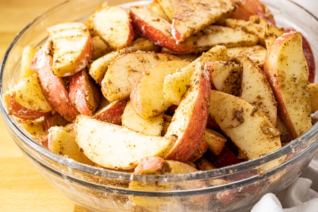 apples coated in cinnamon, nutmeg and brown sugar