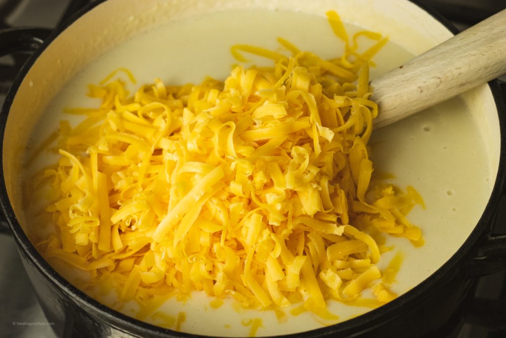 creamy cauliflower soup topped with cheddar cheese to make cheesy cauliflower soup