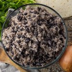 glass bowl with black beans and rice