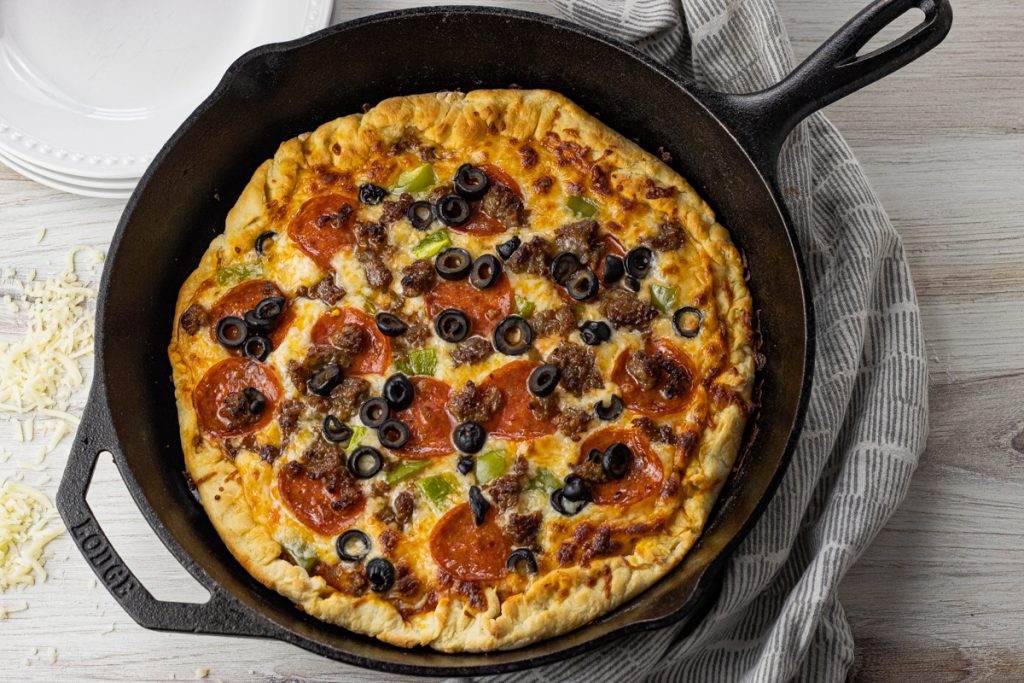 pizza baked in a cast iron pan