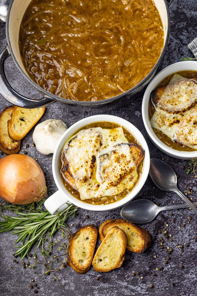 onion soup topped with Swiss cheese and bread slices