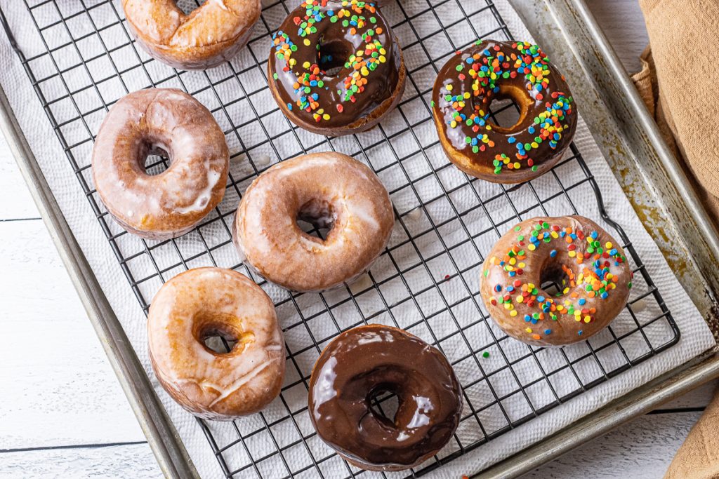 various donuts on a cooling rack