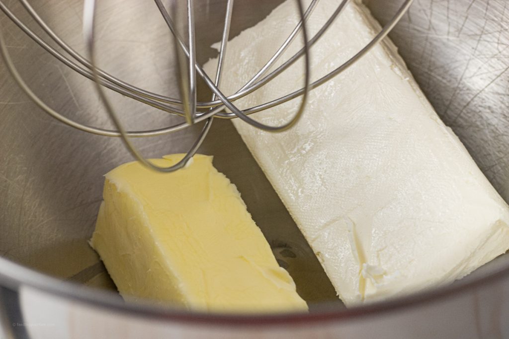 butter and cream cheese in the bowl of a stand mixer