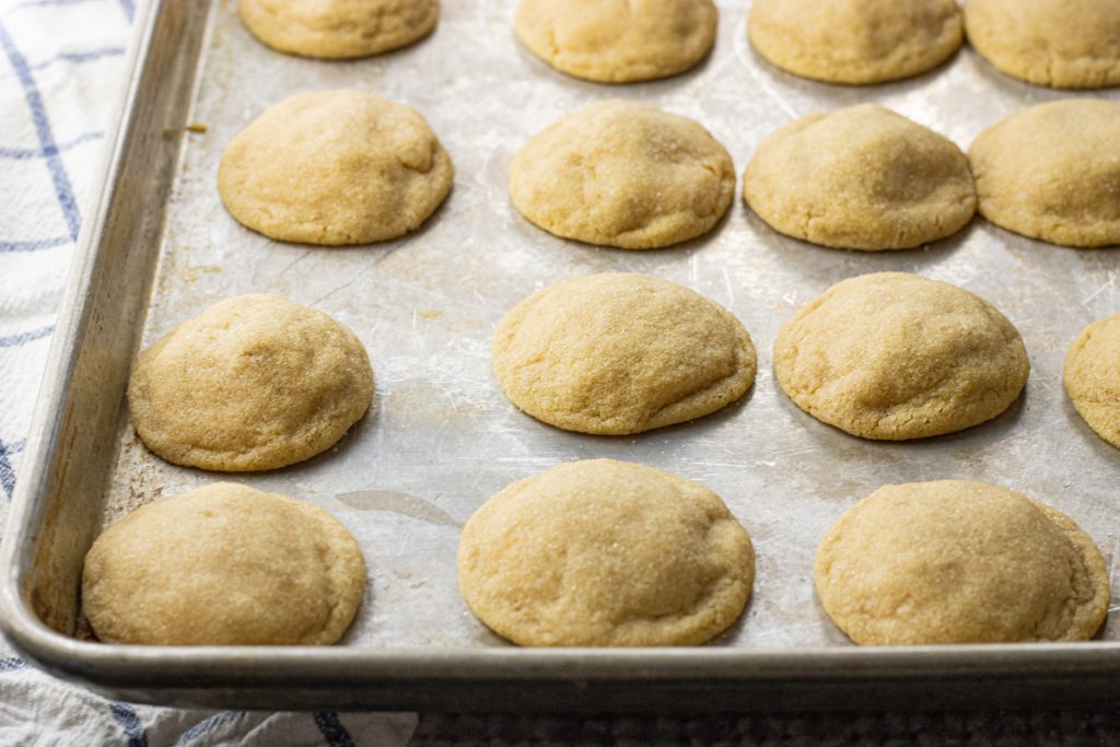 baked peanut butter cookies on a baking sheet