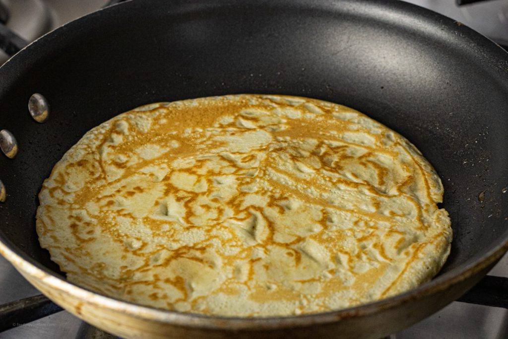 browned crepe in a skillet