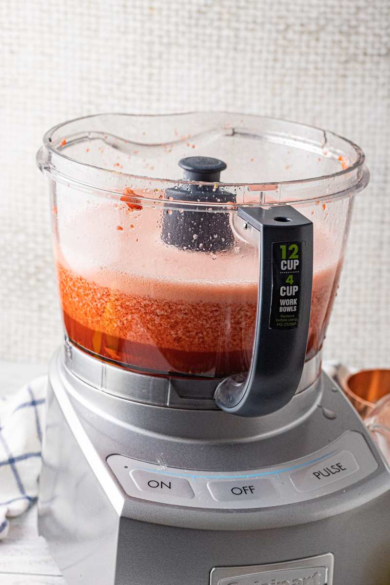 pureed strawberries in a food processor